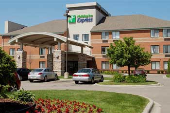 Holiday Inn Detroit Metro hotel exterior near DTW airport offering park and stay packages with secure Detroit airport parking.
